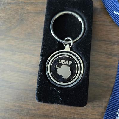 Large brass key - key hanger and a selection of keychains