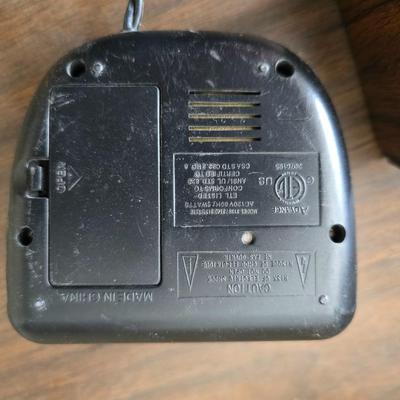 Brother Inkjet multi-function center / printer and a paper shredder with an assortment of alarm clocks