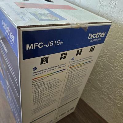 Brother Inkjet multi-function center / printer and a paper shredder with an assortment of alarm clocks