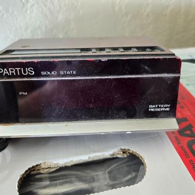 Brother Inkjet multi-function center / printer and a paper shredder with an assortment of alarm clocks