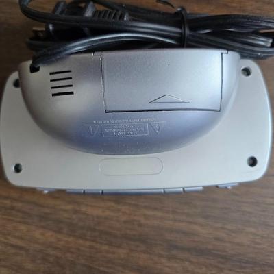 Brother Inkjet multi-function center / printer and a paper shredder with an assortment of alarm clocks