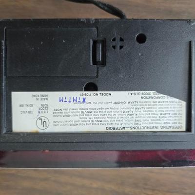 Brother Inkjet multi-function center / printer and a paper shredder with an assortment of alarm clocks