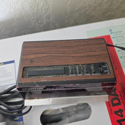 Brother Inkjet multi-function center / printer and a paper shredder with an assortment of alarm clocks