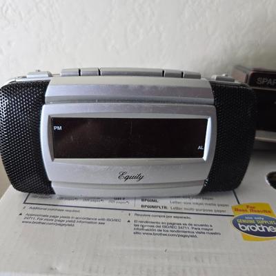 Brother Inkjet multi-function center / printer and a paper shredder with an assortment of alarm clocks