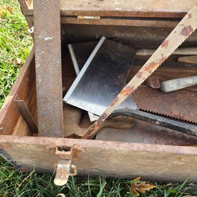 Two old rusty metal boxes with contents of old tools and misc.