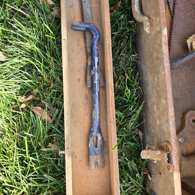 Two old rusty metal boxes with contents of old tools and misc.
