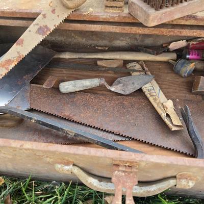 Two old rusty metal boxes with contents of old tools and misc.