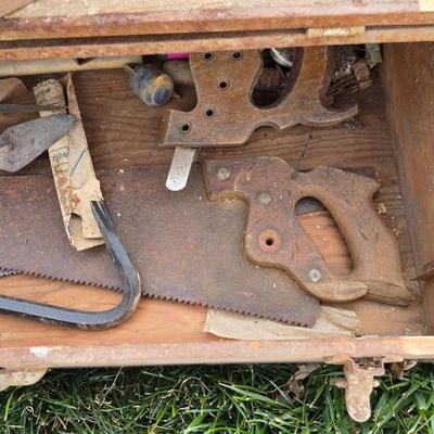 Two old rusty metal boxes with contents of old tools and misc.