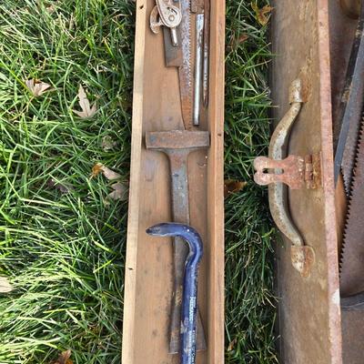 Two old rusty metal boxes with contents of old tools and misc.
