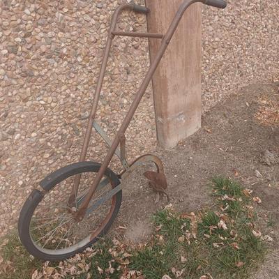 Antique hand driven garden plow