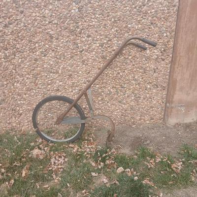 Antique hand driven garden plow