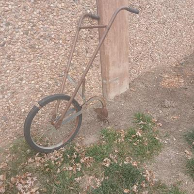 Antique hand driven garden plow
