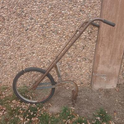 Antique hand driven garden plow