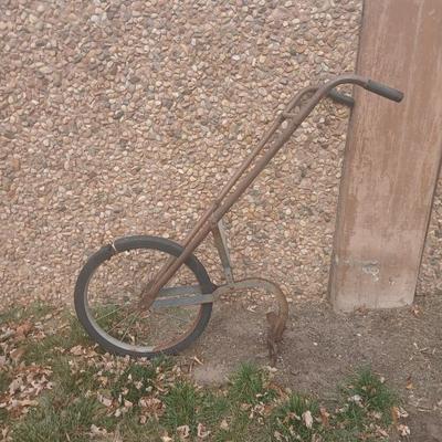 Antique hand driven garden plow