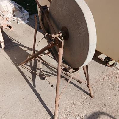 Antique foot-powered grindstone