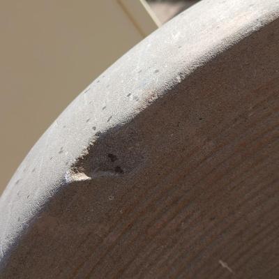 Antique foot-powered grindstone