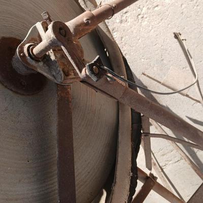 Antique foot-powered grindstone