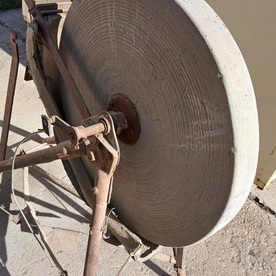 Antique foot-powered grindstone