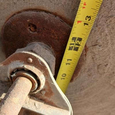 Antique foot-powered grindstone