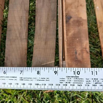 Two old wooden crateswith a round wood container