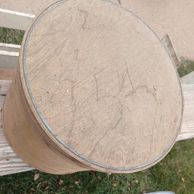 Two old wooden crateswith a round wood container