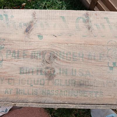 Wood crates with round wooden cheese container
