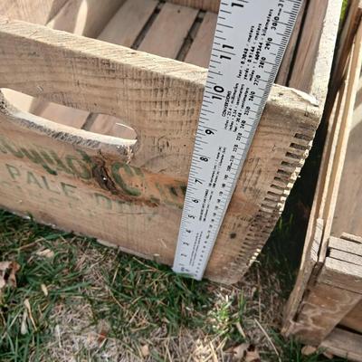 Wood crates with round wooden cheese container