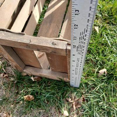 Wood crates with round wooden cheese container