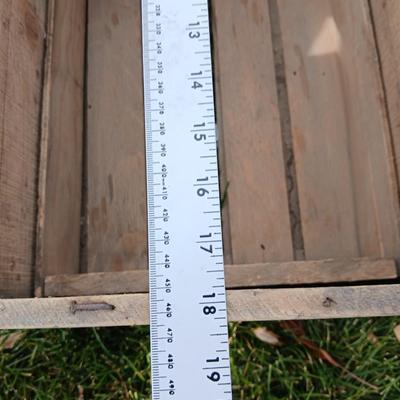 Wood crates with round wooden cheese container