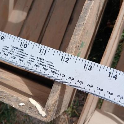 Wood crates with round wooden cheese container
