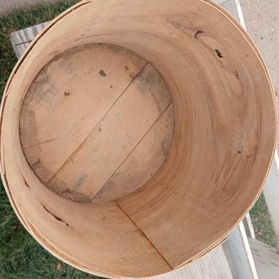 Wood crates with round wooden cheese container