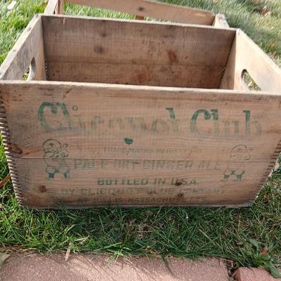 Wood crates with round wooden cheese container