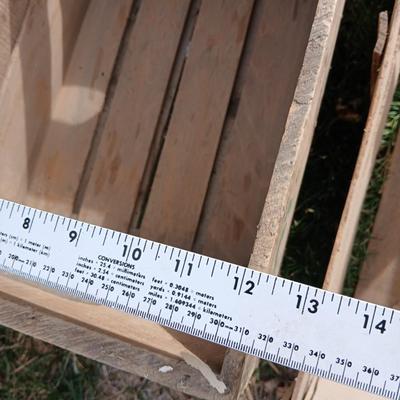 Wood crates with round wooden cheese container