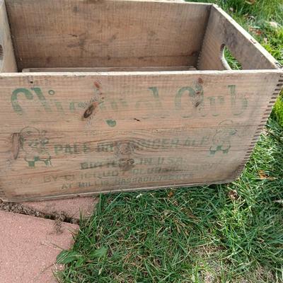 Wood crates with round wooden cheese container