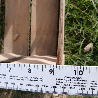 Wood crates with round wooden cheese container