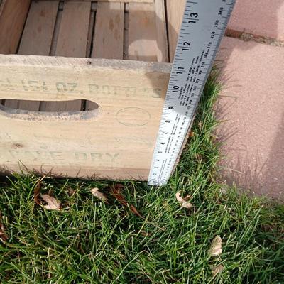 Wood crates with round wooden cheese container