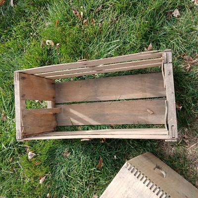 Wood crates with round wooden cheese container
