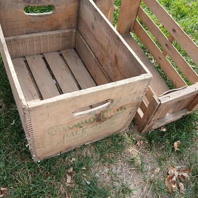 Wood crates with round wooden cheese container