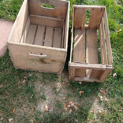 Wood crates with round wooden cheese container