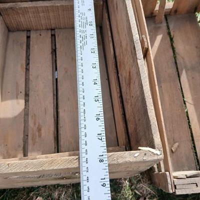 Wood crates with round wooden cheese container