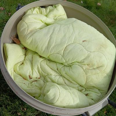 Two trash cans with lids