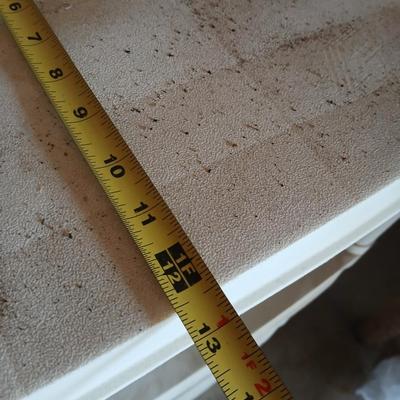 Two plastic storage shelves