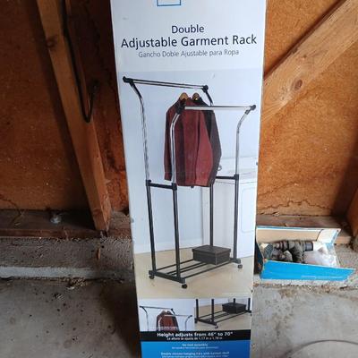 Brand new sealed Mainstays double Adjustable Garment / clothes rack