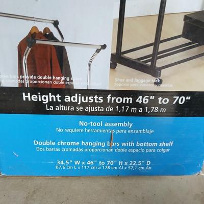 Brand new sealed Mainstays double Adjustable Garment / clothes rack