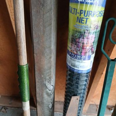 Gardening items - roll of new net fencing - short landscape timbers- rakes and more