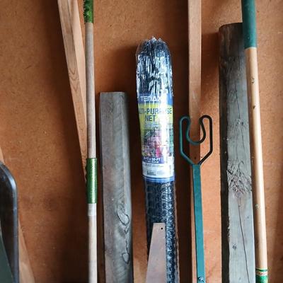 Gardening items - roll of new net fencing - short landscape timbers- rakes and more