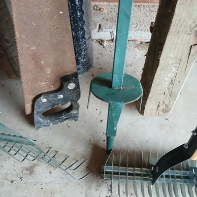 Gardening items - roll of new net fencing - short landscape timbers- rakes and more