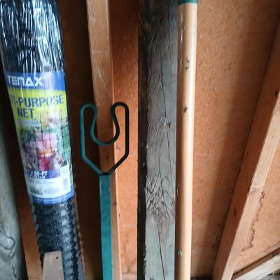 Gardening items - roll of new net fencing - short landscape timbers- rakes and more