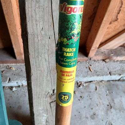 Gardening items - roll of new net fencing - short landscape timbers- rakes and more