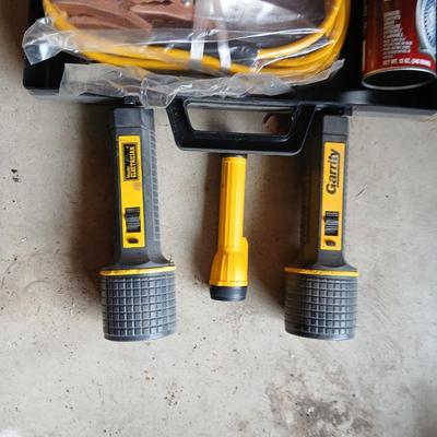 Emergency roadside kit with flashlights